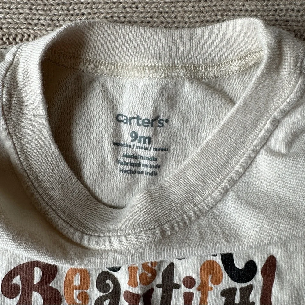 EUC Carter’s Unisex Short Sleeve Onesie, “Black is Beautiful,” 9 Months